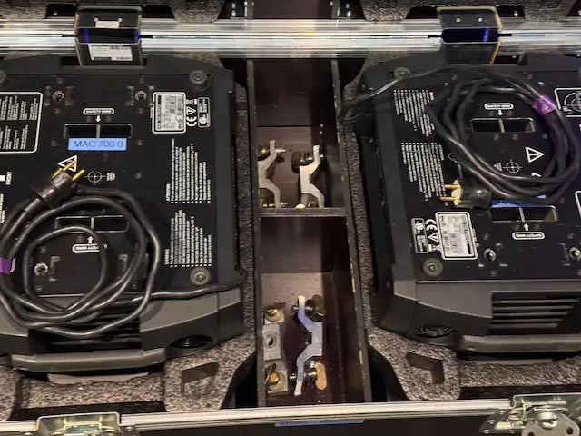 Martin MAC700 moving lights – 12 with dual flight cases