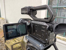 Load image into Gallery viewer, Panasonic HC‑X2000E Camcorder Bundle with Tripod &amp; Case
